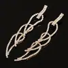 Accesorios de Moda Largos Exagerados de Tendencia Estilo Europeo y Americano Punk Pendientes de Flor Hueca Completamente Incrustados de Diamantes E400