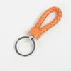 Llavero de cuerda de cuero tejido llavero creativo colgante colgante de pareja llavero cuerda colgante de bolsa de cuerda al por mayor