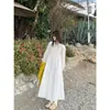 Otoño 2026 Nuevo Estilo Coreano Chaleco de Punto en Capas Chaleco Blanco Vestido Casual de Atar Conjunto de Dos Piezas Moda para Mujer