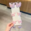 Cadena trenzadora de mariposa súper hada para niños 2026 Nuevo estilo Pinza para el pelo con borla de perla de princesa para niñas Tocado Pinza para el pelo de niña pequeña