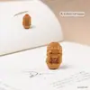 Directo de fábrica tallado de sándalo caricatura lindo estilo nacional texto juego a través del agujero accesorios llavero colgante accesorios venta al por mayor
