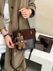 Nuevos Dijes para Bolsos Mini Simples Sensación de Alta Gama Bolsos de Tote Perezosos para Vacaciones para Mujeres Otoño Invierno Bolsos de Mano Retro