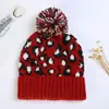 Nuevo gorro de punto de invierno al por mayor versión coreana del gorro de lana de leopardo bola directa cálido grueso en stock