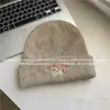 Coreia do Sul Bonito Filhote De Cachorro Bordado Chapéu De Malha Das Mulheres Inverno Novo Chapéu De Lã Quente All-match Casual Proteção Da Orelha Chapéu Frio para Homens