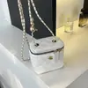 Bolsa pequena com trama de diamante feminina 2026 novo estilo design de nicho bolsa caixa simples e moderna bolsa com corrente bolsa de ombro único transversal da moda