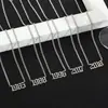 Venta Caliente Transfronteriza DIY Collar Digital de Año Cadena para Suéter de Aniversario Acero de Titanio Galvanoplastia al Vacío Joyería de Diseño Privado