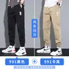 Pantalones casuales para hombre, marca nueva de moda de seda helada de otoño, corte holgado, estilo jogger, pantalones cargo deportivos cropped para primavera y otoño para hombre