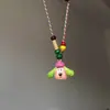 Colar pingente de cachorrinho de cerâmica com orelhas grandes, divertido e fofo, para mulheres, acessório pendente de corda trançada com contas coloridas