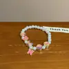 [Robo de Flor de Durazno] Pulsera de Mariposa de Color Dulce Moda para Mujer Pulsera Pequeña de Flor de Perla de Alto Valor para Novias