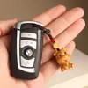 Palo de rosa Buey de la suerte Zodiaco Buey Llavero de coche Buey pequeño lindo Cadena para teléfono móvil Colgante Colgante para mochila escolar
