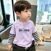 Camiseta de manga larga de dos piezas de imitación para niños, nuevo modelo de principios de otoño 2026, top de algodón puro para primavera y otoño, camiseta interior para niños mayores