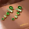 Pendientes Ovalados de Aguja de Plata Diamante Esmeralda Transfronterizos Estilo Resort Costero Borla Verde Pendientes Exagerados Pendientes Blancos