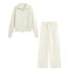 Atacado transfronteiriço 2026 estilo europeu e americano moda zíper gola grande conjunto de suéter de malha + calça para mulheres E75502