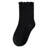 Calcetines de media caña para niños para primavera y otoño, hechos de algodón peinado con bordes de volantes, ajuste holgado sin apretar, calcetines para niños con volantes decorativos