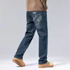 Moda popular para hombre / Nueva colección Primavera/Otoño 2026: pantalones de mezclilla elásticos para hombre, tiro medio a alto, ligeros, estilo casual de negocios, corte ajustado, versátiles