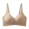 Sutiã de sustentação e levantamento sem costura cor nude com bojo fixo para seios pequenos, push-up, anti-flacidez, suporte macio, que acomoda os seios, sem aro de metal para mulheres
