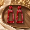 Aretes Geométricos Rojos Ankela Festivos de Año Nuevo Nicho Temperamento Venta Caliente Aretes de Botón Otoño/Invierno 2026 Venta al por Mayor de Pendientes