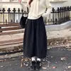 Nueva falda midi de estilo coreano para mujer para otoño e invierno con cintura elástica, falda calabaza, holgada y estilizada, versátil falda midi de línea A
