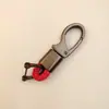 Llavero de coche de alta gama puede ser radiación láser llavero para hombre de negocios anti-pérdida hebilla de llave pequeños regalos al por mayor