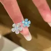 Anillo de doble flor de diamantes completos estilo francés para mujer, nuevo modelo 2026, diseño de nicho, anillo de lujo de alta gama