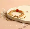 Feroz como el Fuego Bolsos de Nuevo Estilo Chino Pulsera Elegante de Moda con Perlas de Vidrio Estilo Chino Pulsera Nacional de Moda de Alta Calidad