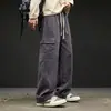 Pantalones de trabajo de algodón de estilo americano modernos con múltiples bolsillos para hombre, nuevos pantalones rectos de color liso versátiles de ajuste holgado casual para primavera/otoño