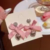 Brincos Pendentes Coração com Laço Rosa Design de Nicho de Alta Qualidade para Mulheres Exagerados Doces Únicos Super Bonitos Joias para Orelha