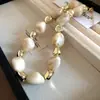 Collar de doble capa con cuentas acrílicas transfronterizo europeo y americano, cadena para la clavícula de lujo ligero de alta gama, joyería de estilo étnico vintage al por mayor