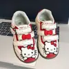 Zapatillas para niños 2026 otoño nuevo dibujos animados gato KT zapatos casuales para niñas suela blanda zapatos casuales zapatos de entrenamiento alemanes para niñas pequeñas