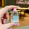 Botella Creativa de Acrílico con Aceite y Arena Movediza, Taza Luminosa, Colgante para Llavero, Accesorios para Coche, Adornos de Escritorio