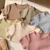 Camiseta Básica de Algodón Transpirable con Jacquard de Corazones Clase A para Niños Cuello Redondo Manga Corta Color Caramelo Nuevo 2026 para Niños y Niñas