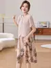 Vestido de gasa estampado de manga corta, moderno y elegante, para madres de mediana edad, nuevo estilo verano 2026, vestido falso de dos piezas hasta la rodilla