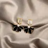 Brincos de Pérola Coreanos de Alta Qualidade 2026, Agulha de Prata Estilo Vintage Chanel Diamante Colorido Estrela de Oito Pontas Brincos de Tarraxa Atacado