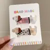 2026 Nuevo Pasador de Pelo de Dibujos Animados Pasador de Pelo Dulce con Lazo Pinza Lateral Exquisita de Gama Alta Pinza de Pato