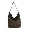 Bolso grande casual para mujer en un estilo relajado, nuevo modelo 2026, bolso tote único con estampado de leopardo, bolso de hombro moderno y de moda de gran capacidad