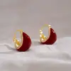 Pendientes de frijol rojo vino de alta calidad Diseño francés antiguo Pendientes de gota de agua Otoño e Invierno Nuevos Pendientes Vintage