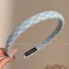 Diadema retorcida fresca y elegante, de lujo ligero para mujer, adecuada para el uso diario en primavera y verano, diadema de ala ancha, dulce accesorio para el cabello estilo coreano