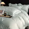 Conjunto premium de quatro peças em algodão de fibra longa com 200 fios, lençol de cima 100% algodão puro, lençol com elástico e capa de edredom, oferecendo uma experiência de cama luxuosa