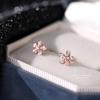 S999 Plata de ley aretes de flor pequeña de circonita para pie mujer simple pequeño lindo pequeño fresco Mori dulce temperamento aretes al por mayor