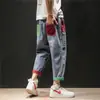 Jeans rasgados de moda para hombre con cintura elástica y cordón, corte recto holgado, estilo callejero americano, bolsillos de color en bloque geniales