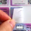 Venta al por mayor de etiquetas antifalsificación de código QR a cuatro colores con números de serie variables; se añaden marcas anti-falsificación sin aumentar el precio; etiquetas adhesivas anti-falsificación