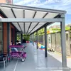 Toldo plegable impermeable de pared para terraza de villa, toldo solar retráctil eléctrico de aleación de aluminio, techo de toldo impermeable para patio