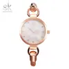 Shengke Shengke K0026 Pulsera de Moda Tendencia Europea y Americana Reloj de Pulsera para Mujer Redondo Simple Reloj de Cuarzo para Mujer Venta al por Mayor
