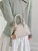 Bolso de Mano Pequeño Estilo Coreano Transfronterizo para Mujer 2026 Nueva Moda Bolso de Hombro Casual Bolso Cruzado Tipo Almohada
