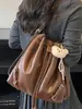 Shuai Mi Home Bolso Cubo de Moda Coreana con Cordón Simple 2026 Nuevo Nicho de Moda de Alto Valor Bolso de Hombro