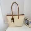 Bolso tote tejido único para mujer, nueva moda 2026, bolso de hombro retro para debajo del brazo, bolso de mano de gran capacidad para el día a día