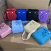 Bolsa de gelatina popular transfronteiriça para atacado para férias e natação, bolsa infantil de buraco em EVA, mini bolsa de mão fofa para praia
