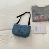 Bolsa de Tela Gran Capacidad Bolsa para Empanadas Bolso Cruzado Primavera 2026 Nuevo Color Sólido Casual Ligero Estilo Deportivo Bolso de Hombro de Moda