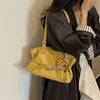 Bolso de mano de estilo relajado, bolsa grande de capacidad casual para commuting para mujer, nuevo modelo 2026, bolso de hombro de alta gama para debajo del brazo
