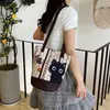 Bolsa de lona de desenho animado mais vendida, pequena bolsa tote, bolsa para garrafa de água, bolsa de presente personalizada da moda impressa em ambos os lados, direto do fabricante